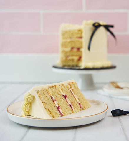 White and Black Ribbons and Ruffles Cake