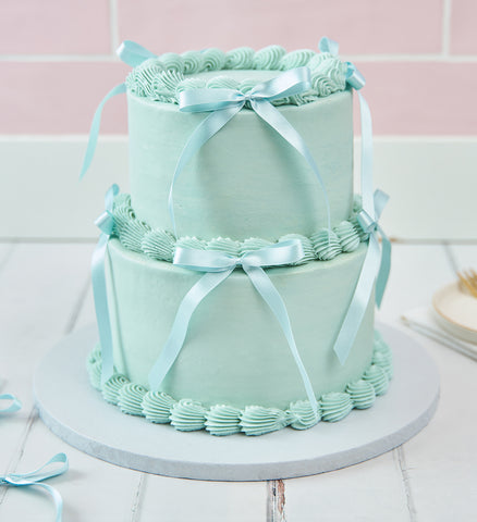 Blue Mini Two Tier Ribbons and Ruffles Cake