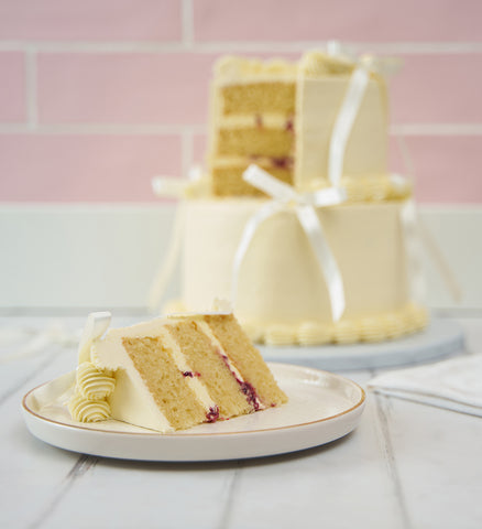 White Mini Two Tier Ribbons and Ruffles Cake