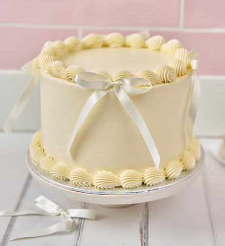 White Ribbons and Ruffles Cake