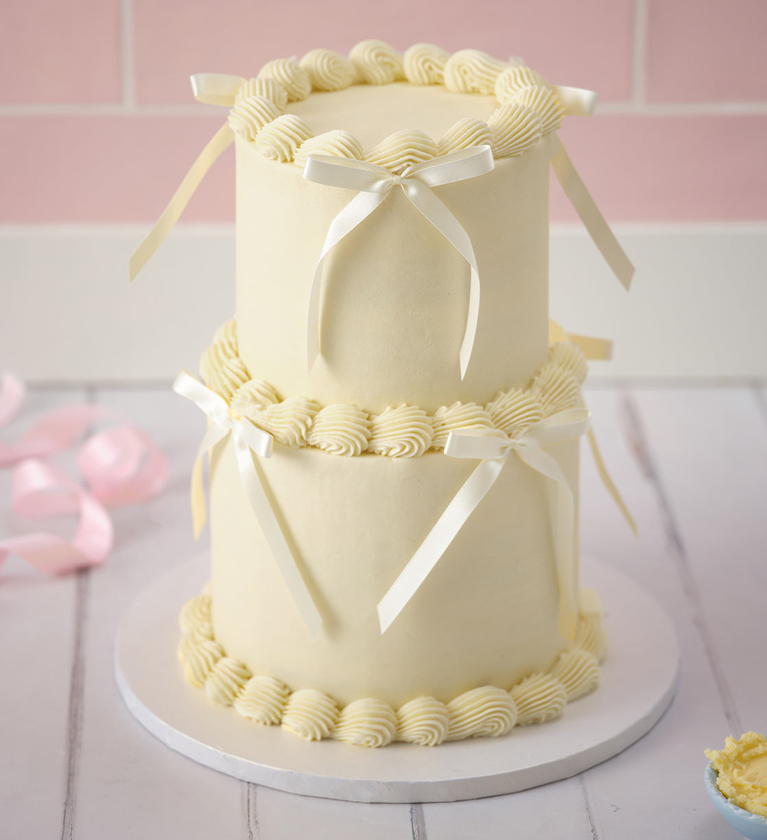 White Mini Two Tier Ribbons and Ruffles Cake