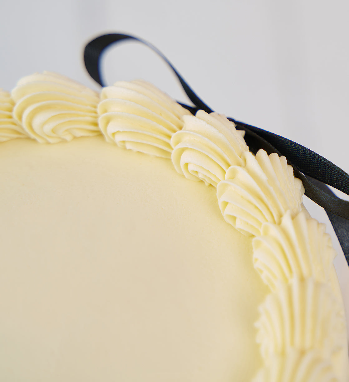 White and Black Ribbons and Ruffles Cake