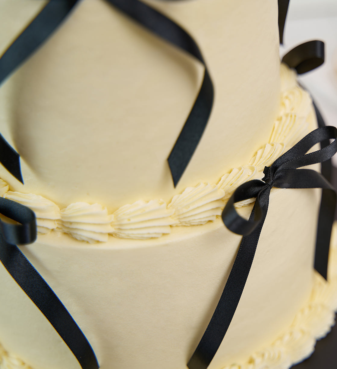 White and Black Mini Two Tier Ribbons and Ruffles Cake